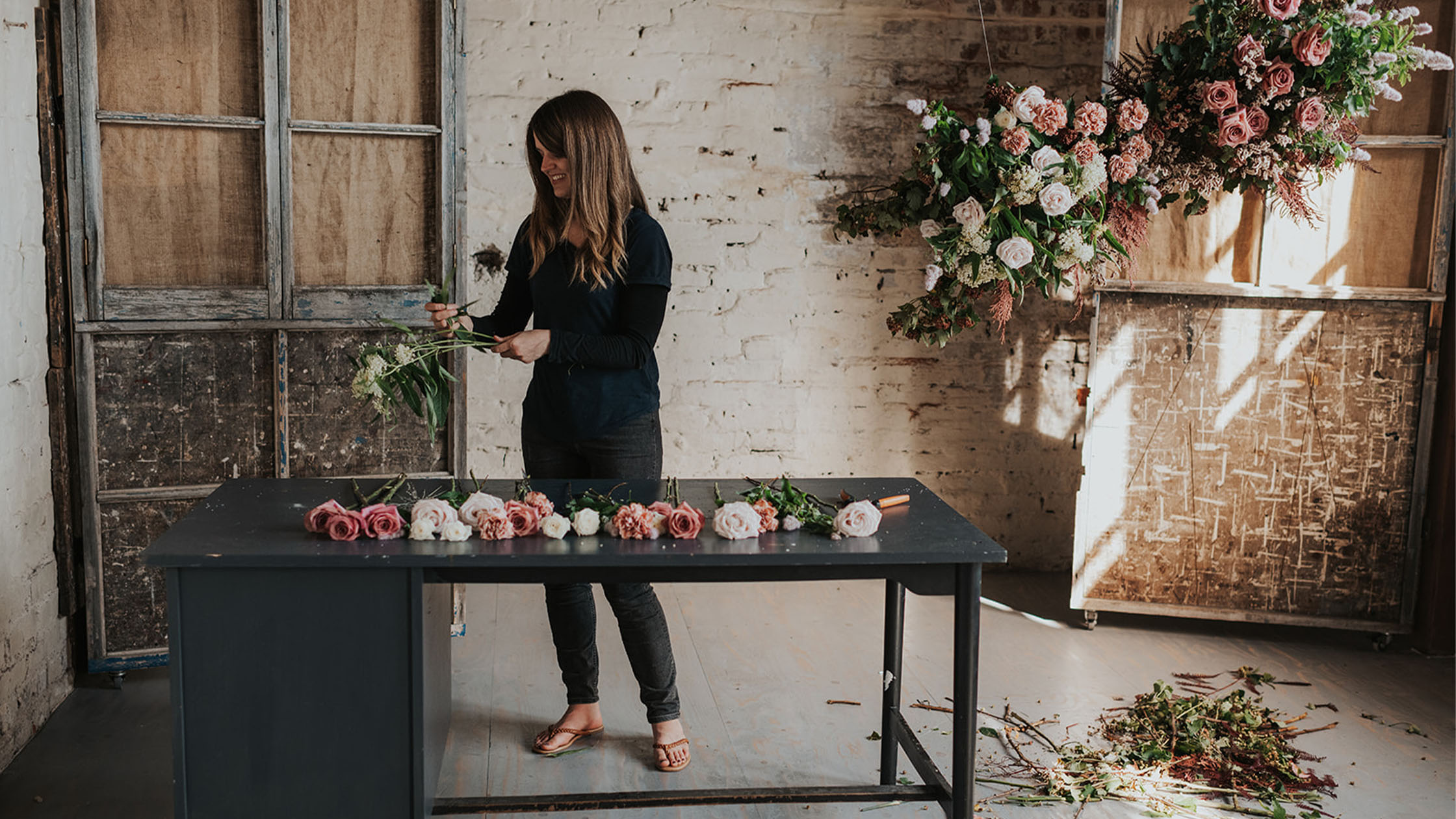 Gemma Nash arranging flowers